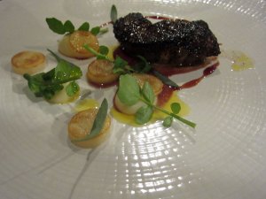 Roasted monkfish in our spices, chervil root and wild watercress